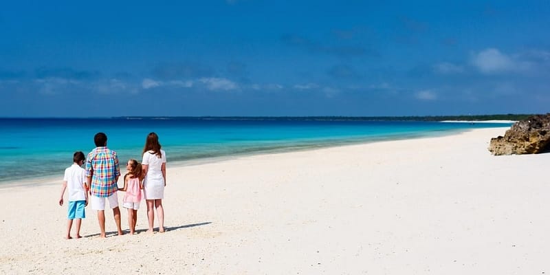 Family on the beach in the Caribbean